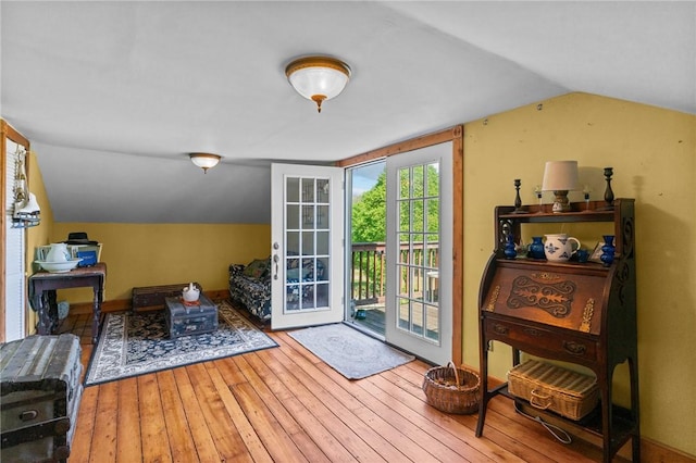 48 Highview Ave, Hopkinton, RI 02832 - doorway to outside with vaulted ceiling and wood-type flooring