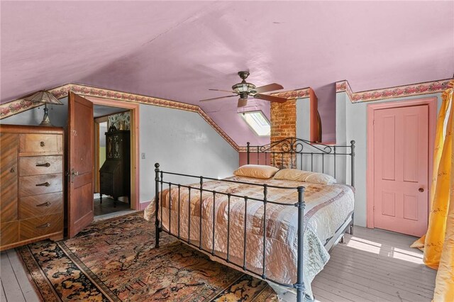 48 Highview Ave, Hopkinton, RI 02832 - bedroom with wood-type flooring, vaulted ceiling, and ceiling fan