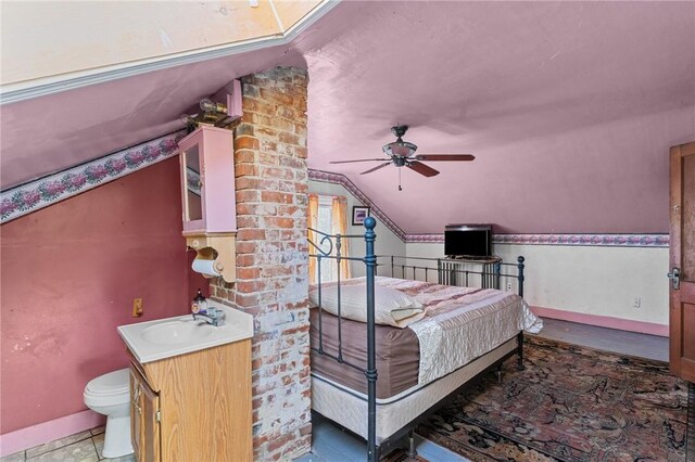 48 Highview Ave, Hopkinton, RI 02832 - bedroom featuring lofted ceiling, baseboards, and a sink