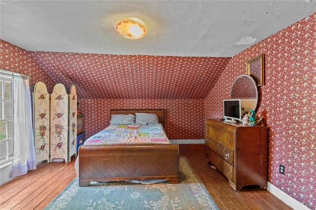 48 Highview Ave, Hopkinton, RI 02832 - bedroom with wallpapered walls, hardwood / wood-style floors, and baseboards