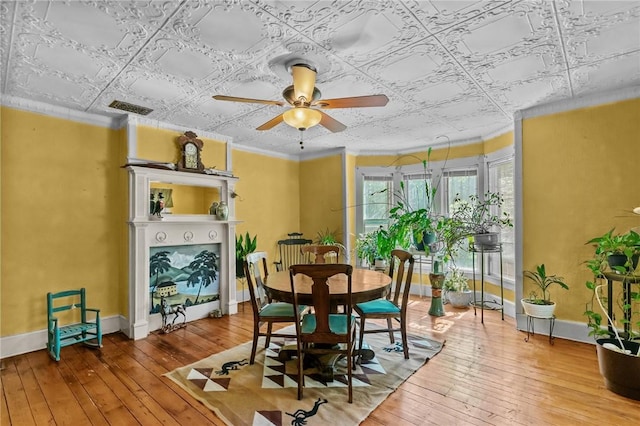 48 Highview Ave, Hopkinton, RI 02832 - dining space featuring an ornate ceiling, hardwood / wood-style floors, ceiling fan, baseboards, and crown molding