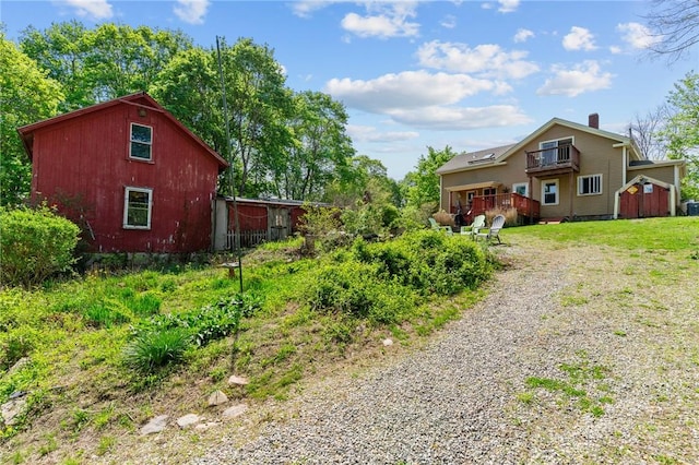 48 Highview Ave, Hopkinton, RI 02832 - view of side of property with gravel driveway