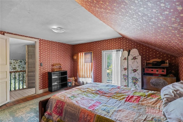 48 Highview Ave, Hopkinton, RI 02832 - bedroom featuring wood finished floors, lofted ceiling, and wallpapered walls