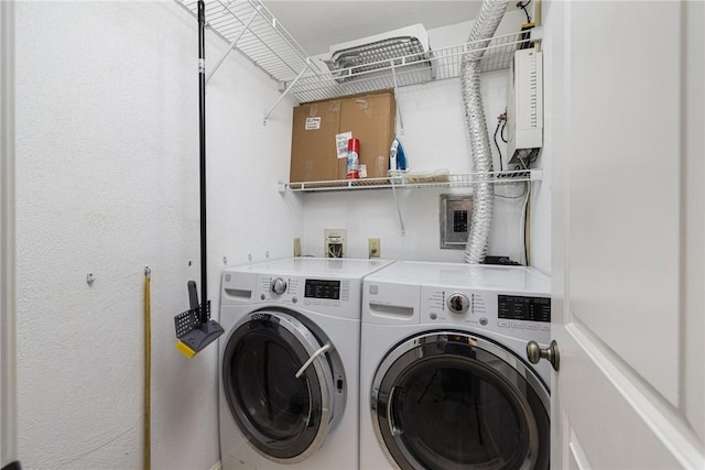 washroom with laundry area and washing machine and clothes dryer