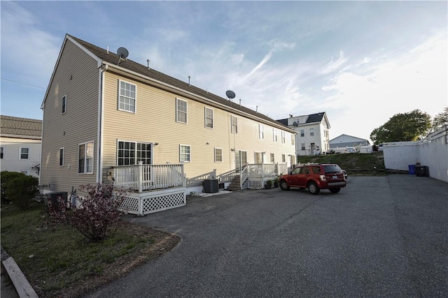 17 Grotto Ave Unit 1, Pawtucket, RI 02860 - back of property featuring cooling unit and a wooden deck