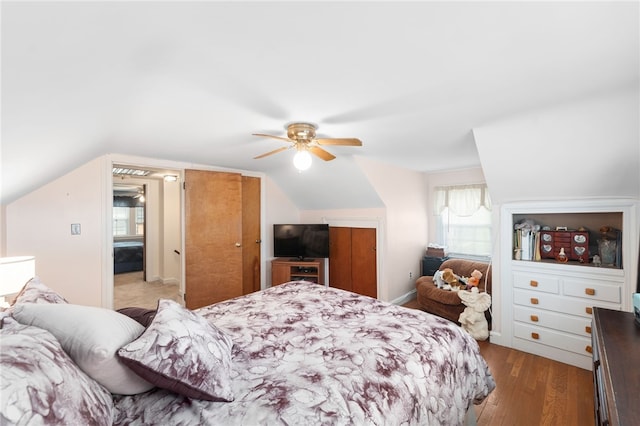141 Burns St, Providence, RI 02904 - bedroom featuring multiple windows, vaulted ceiling, wood finished floors, and ceiling fan