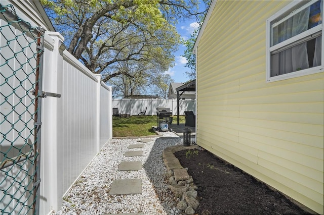 view of property exterior with fence