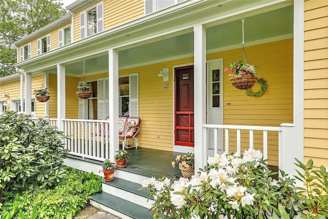 entrance to property with a porch