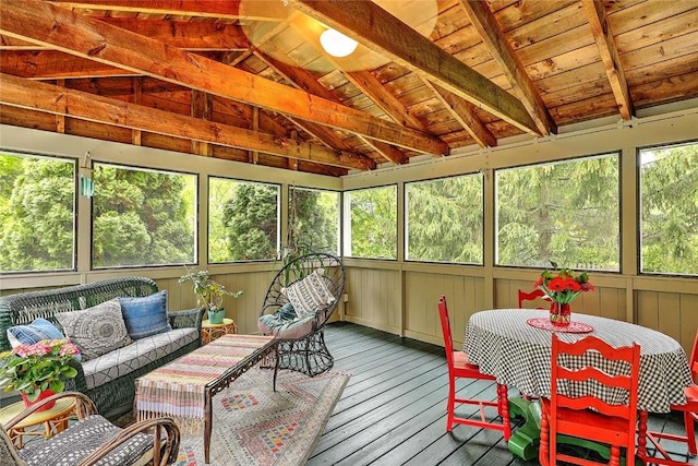 sunroom with an outdoor living space