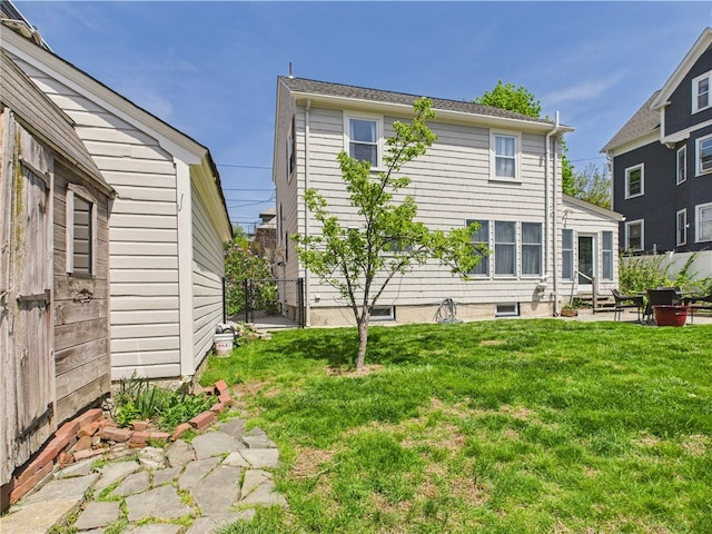 135 Cypress St, Providence, RI 02906 - rear view of house featuring a patio, a gate, fence, a yard, and entry steps