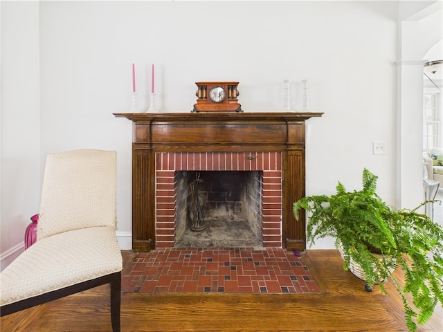 135 Cypress St, Providence, RI 02906 - room details featuring a fireplace and baseboards