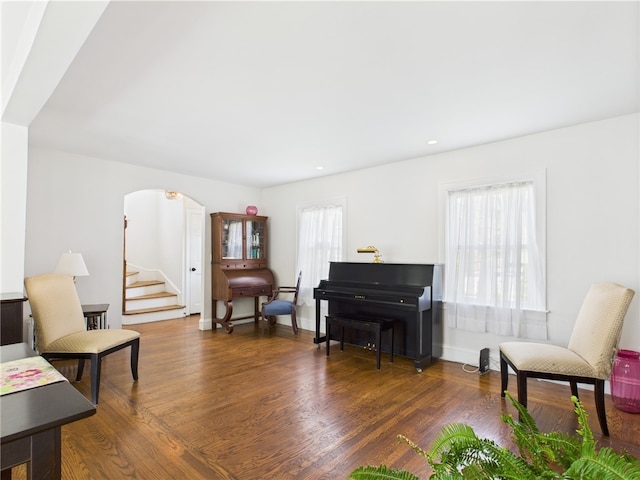 135 Cypress St, Providence, RI 02906 - sitting room featuring stairway, wood finished floors, and arched walkways