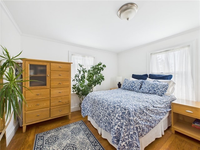135 Cypress St, Providence, RI 02906 - bedroom featuring ornamental molding, wood finished floors, and multiple windows