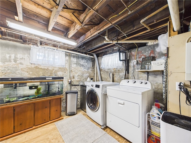 135 Cypress St, Providence, RI 02906 - laundry room featuring washer and clothes dryer, laundry area, and wood finished floors