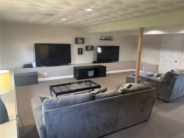 carpeted living room featuring baseboards and visible vents