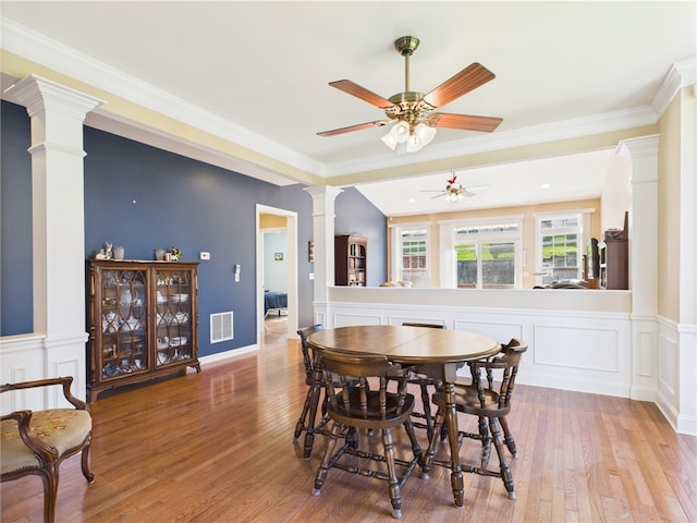 6 Yarmouth Cir S, Kingstown, RI 02879 - dining room with light wood-type flooring, a ceiling fan, visible vents, and decorative columns