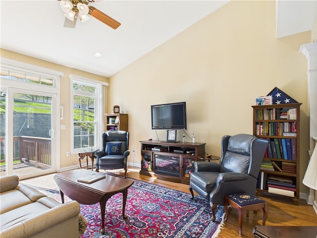 6 Yarmouth Cir S, Kingstown, RI 02879 - living area featuring high vaulted ceiling, baseboards, a ceiling fan, and wood finished floors
