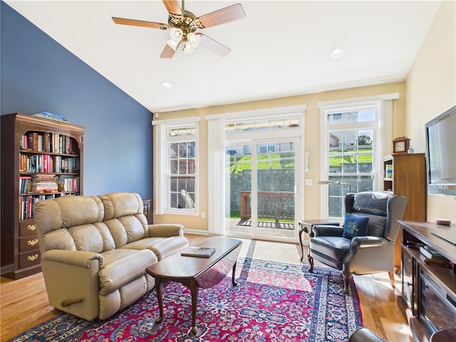 6 Yarmouth Cir S, Kingstown, RI 02879 - living area with lofted ceiling, a ceiling fan, and wood finished floors