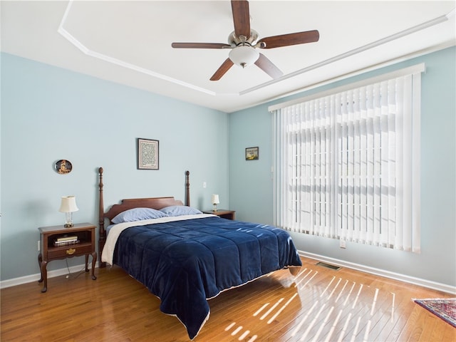 6 Yarmouth Cir S, Kingstown, RI 02879 - bedroom featuring baseboards, ceiling fan, visible vents, and wood finished floors