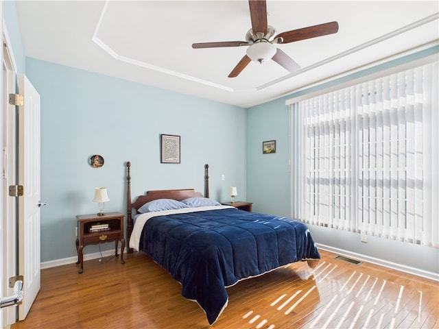 6 Yarmouth Cir S, Kingstown, RI 02879 - bedroom with ceiling fan, baseboards, visible vents, and wood finished floors
