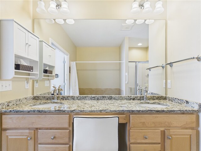 6 Yarmouth Cir S, Kingstown, RI 02879 - full bathroom featuring double vanity, a shower stall, and a sink