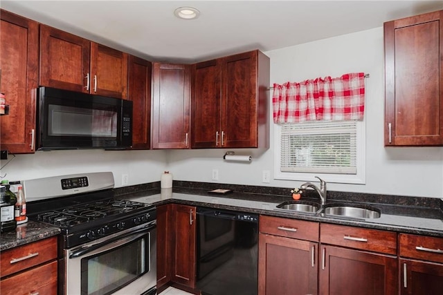 kitchen with dark stone counters, recessed lighting, black appliances, and a sink