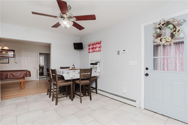 dining area featuring cooling unit, pool table, a ceiling fan, and a baseboard heating unit
