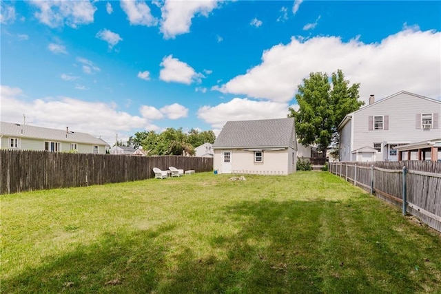 view of yard featuring a fenced backyard