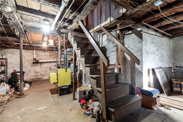 unfinished basement with stairway