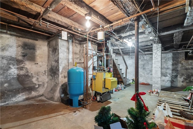 unfinished below grade area featuring stairs