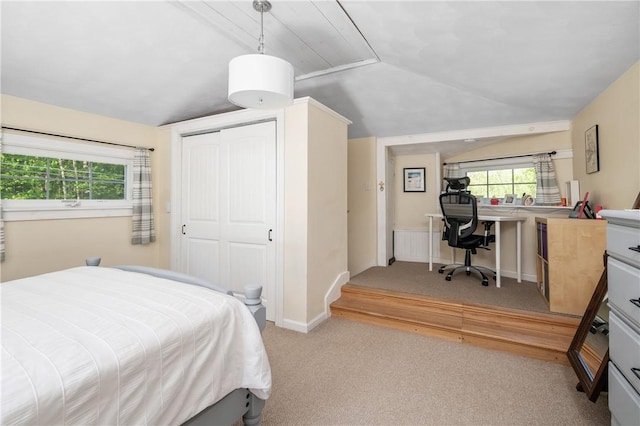 745 Eagle Peak Rd, Burrillville, RI 02859 - bedroom featuring vaulted ceiling, light carpet, a desk, multiple windows, and a closet