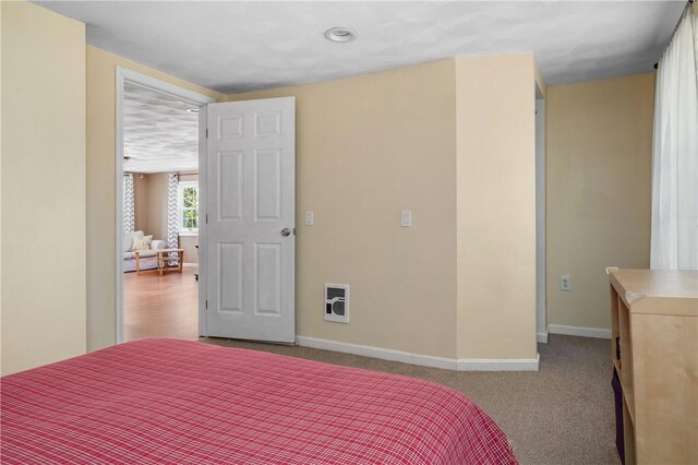 745 Eagle Peak Rd, Burrillville, RI 02859 - carpeted bedroom with baseboards and heating unit
