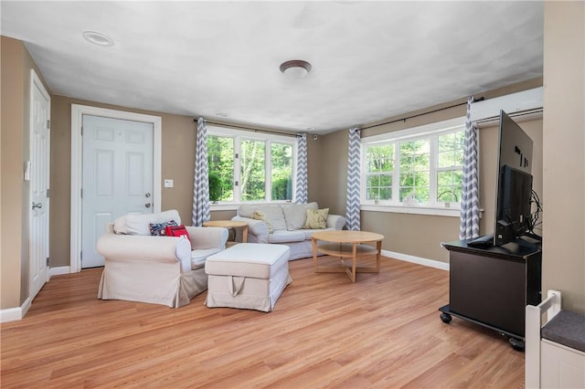 745 Eagle Peak Rd, Burrillville, RI 02859 - living room featuring light wood-type flooring, baseboards, and healthy amount of natural light