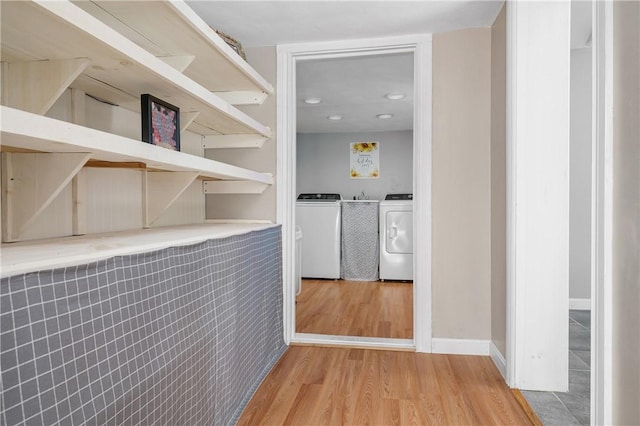 745 Eagle Peak Rd, Burrillville, RI 02859 - hallway with separate washer and dryer, wood finished floors, baseboards, and recessed lighting