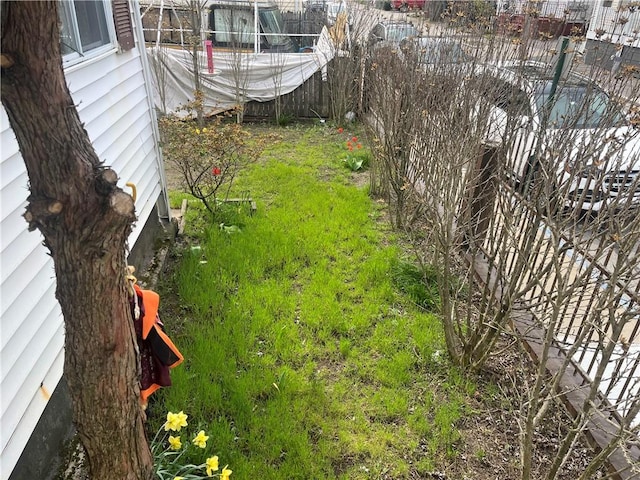view of yard featuring fence
