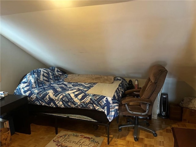 bedroom featuring vaulted ceiling