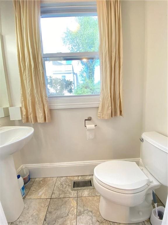 404 Lloyd Ave Unit 408, Providence, RI 02906 - bathroom with toilet and baseboards