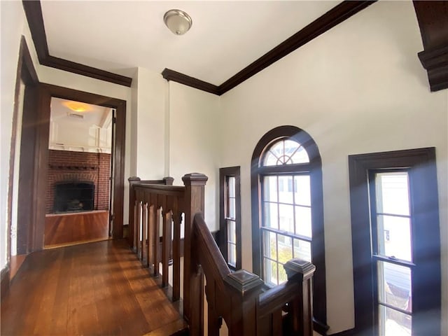 404 Lloyd Ave Unit 408, Providence, RI 02906 - stairway with hardwood / wood-style floors, healthy amount of natural light, ornamental molding, and a brick fireplace