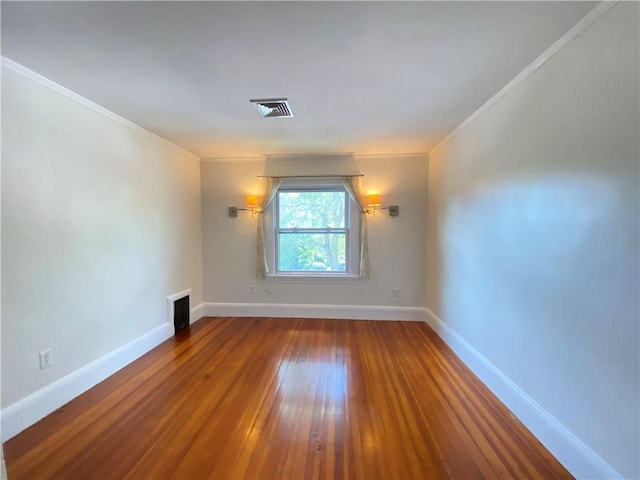 404 Lloyd Ave Unit 408, Providence, RI 02906 - unfurnished room with wood-type flooring, baseboards, and crown molding