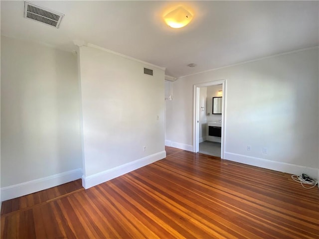 404 Lloyd Ave Unit 408, Providence, RI 02906 - unfurnished room with baseboards, wood finished floors, and crown molding
