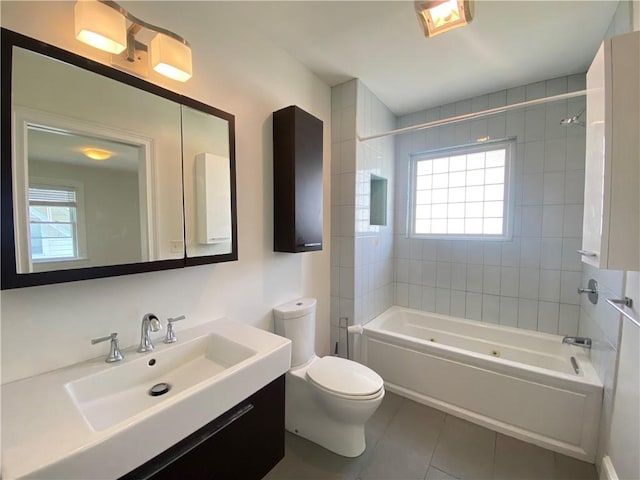 404 Lloyd Ave Unit 408, Providence, RI 02906 - bathroom with tile patterned flooring, a combined bath / shower with jetted tub, toilet, and vanity