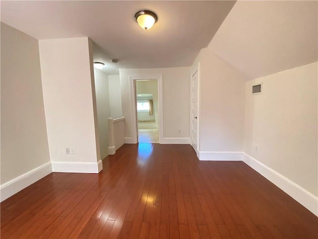404 Lloyd Ave Unit 408, Providence, RI 02906 - bonus room featuring baseboards and dark wood-style floors