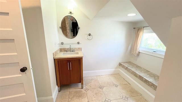 404 Lloyd Ave Unit 408, Providence, RI 02906 - bathroom featuring tile patterned flooring, baseboards, and vanity