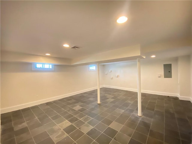 404 Lloyd Ave Unit 408, Providence, RI 02906 - basement with electric panel, recessed lighting, and baseboards