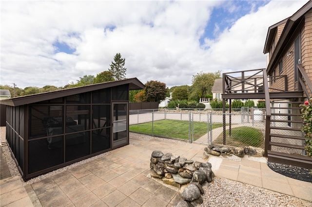 82 Uzzi Ave, Westerly, RI 02891 - view of patio featuring a wooden deck, a sunroom, and fence