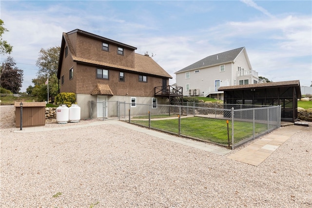 82 Uzzi Ave, Westerly, RI 02891 - view of home's community with a yard, fence, and a gate