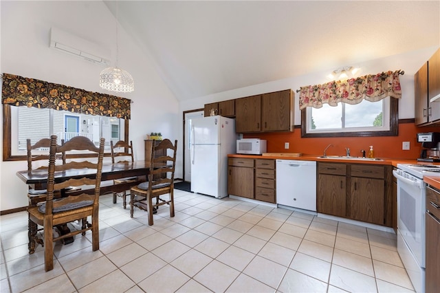 82 Uzzi Ave, Westerly, RI 02891 - kitchen featuring high vaulted ceiling, a sink, white appliances, light countertops, and an AC wall unit