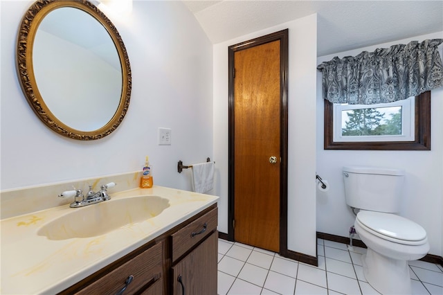 82 Uzzi Ave, Westerly, RI 02891 - bathroom featuring toilet, baseboards, tile patterned flooring, and vanity