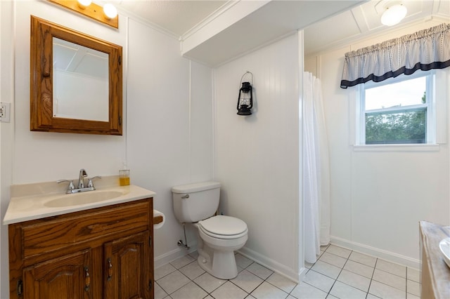 82 Uzzi Ave, Westerly, RI 02891 - bathroom featuring toilet, vanity, ornamental molding, tile patterned flooring, and baseboards