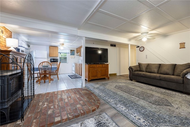 82 Uzzi Ave, Westerly, RI 02891 - living room featuring a ceiling fan, baseboards, and crown molding